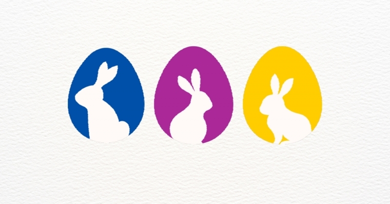Three Easter bunnies in eggs