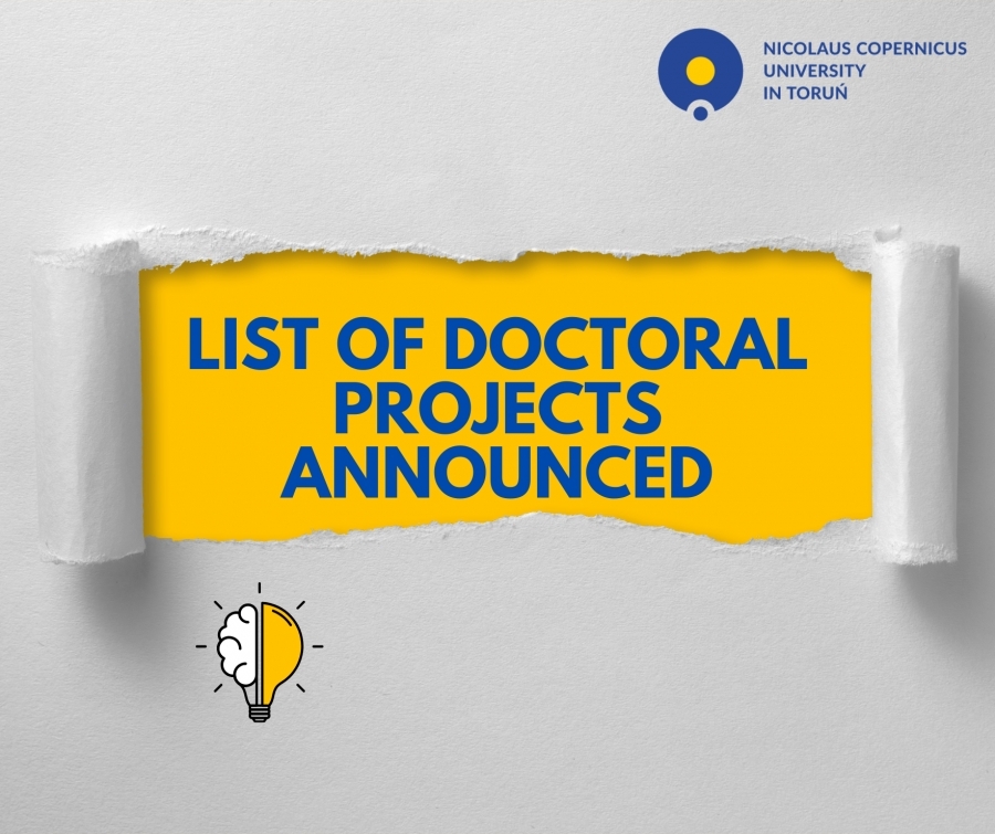 Announcement graphic from Nicolaus Copernicus University in Toruń. The university?s logo and name are displayed in the top right corner. In the center, there is a torn paper effect revealing a bright yellow background with bold blue text that reads: 'LIST OF DOCTORAL PROJECTS ANNOUNCED'. At the bottom left corner, there is a small illustration of a light bulb with one half resembling a brain, symbolizing ideas or research.