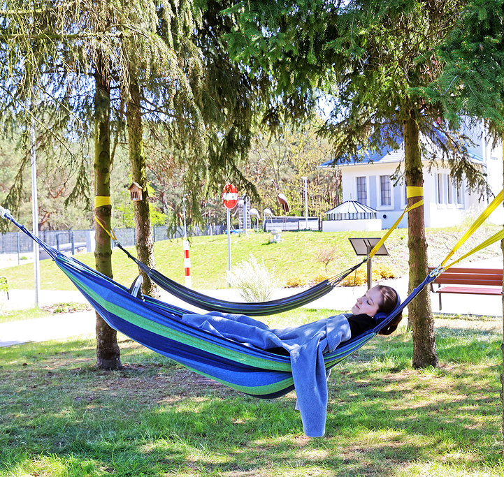 A student relaxing in a hammock at the NCU Copernicus Integration Centre [photo: Andrzej Romański]