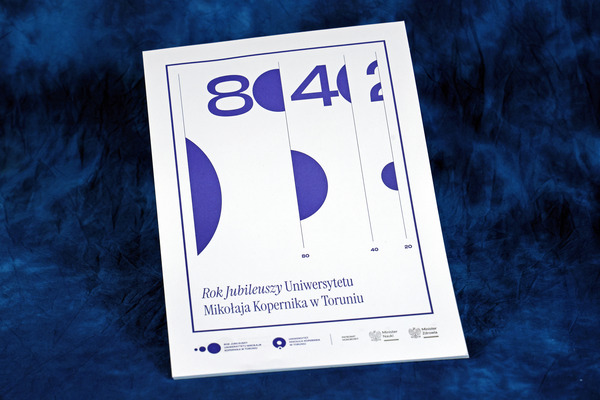 Biały notes z logo roku jubileuszy