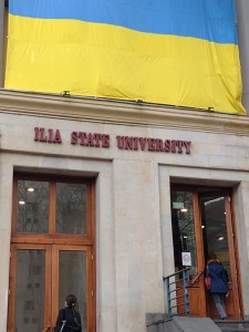 Entrance to Ilia State University langauge center. A flag of Ukraine is hanging above it. Click to zoom the picture.