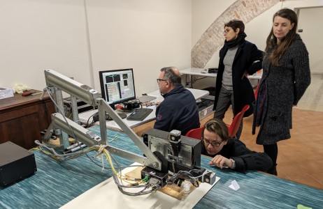 Research on the Gaius manuscript in the Capitoline Library in Verona. Pictured are Magdalena Kowalska, PhD, from the Institute of Physics at the Nicolaus Copernicus University, Maria Luisa Russo (conservator), Magdalena Iwanicka, PhD, prof. from the Faculty of Fine Arts at the Nicolaus Copernicus University and Piotr Targowski, PhD, prof. from the Institute of Physics at the Nicolaus Copernicus University.  Translated with DeepL.com (free version). Click to zoom the picture.