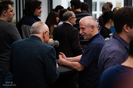 Spotkanie wigilijne w Instytucie Fizyki - kadry z wykładu i poczęstunku . Kliknij, aby powiększyć zdjęcie.