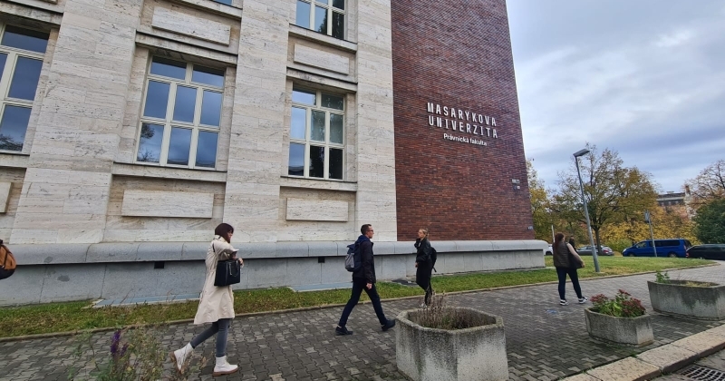 The photo shows the building of the Faculty of Law at Masaryk University in Brno