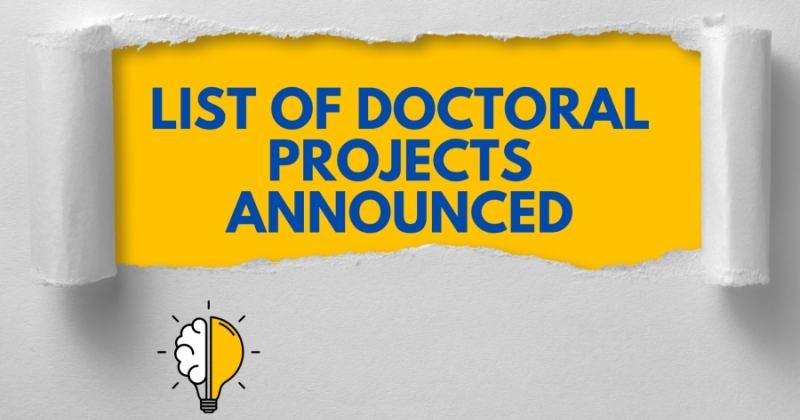 Announcement graphic from Nicolaus Copernicus University in Toruń. The university?s logo and name are displayed in the top right corner. In the center, there is a torn paper effect revealing a bright yellow background with bold blue text that reads: 'LIST OF DOCTORAL PROJECTS ANNOUNCED'. At the bottom left corner, there is a small illustration of a light bulb with one half resembling a brain, symbolizing ideas or research.