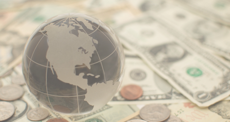 Globe on the pile of money